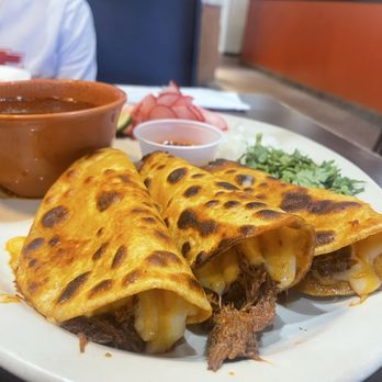 La Papa Loca signature dishes Birria TacosMenudoTacos Dorados
